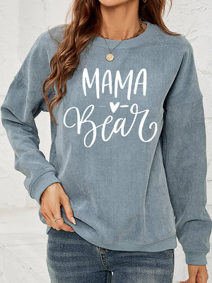 French blue corduroy sweatshirt with white Mama Bear graphic and heart detail.