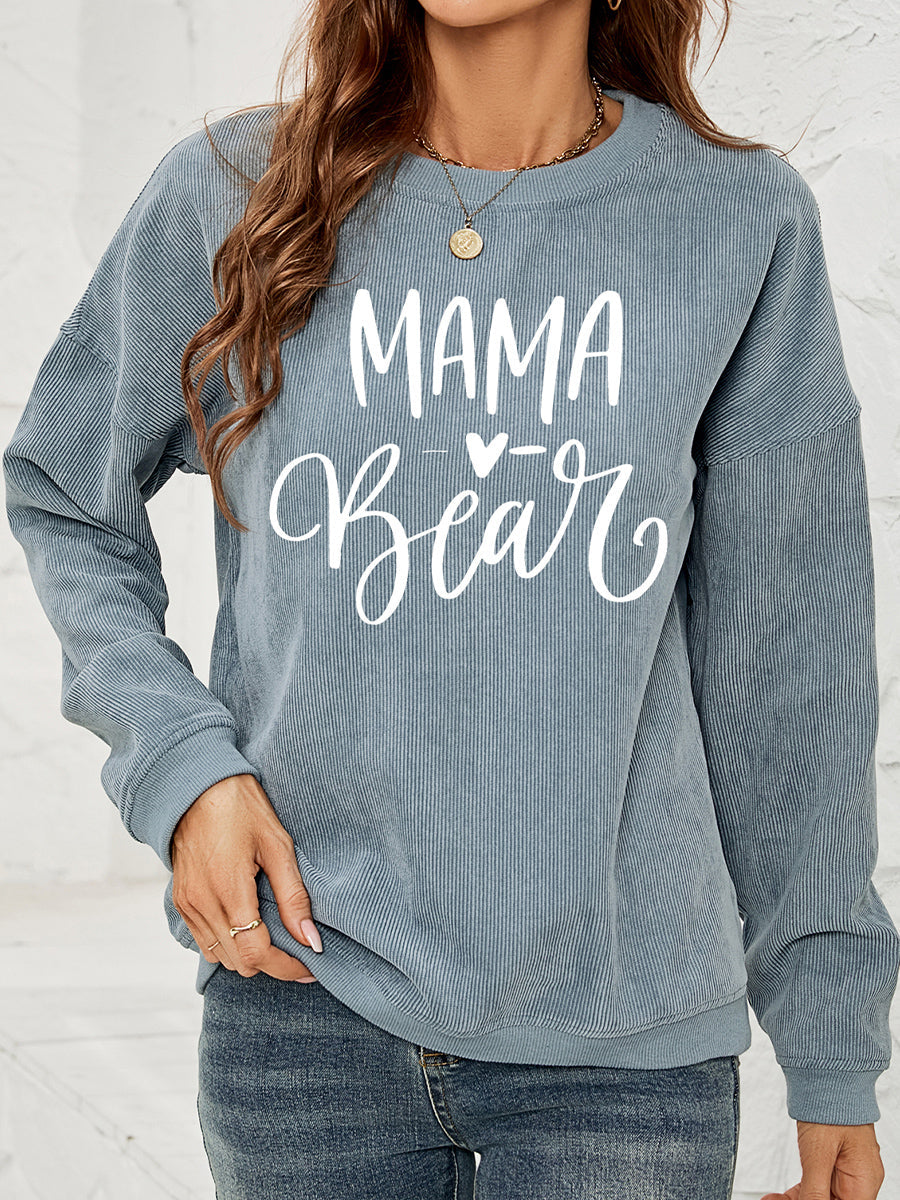 French blue corduroy sweatshirt with white Mama Bear graphic and heart detail.