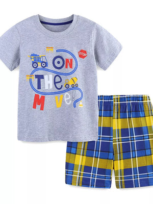 Grey cotton toddler t-shirt with construction graphic and blue yellow plaid shorts.