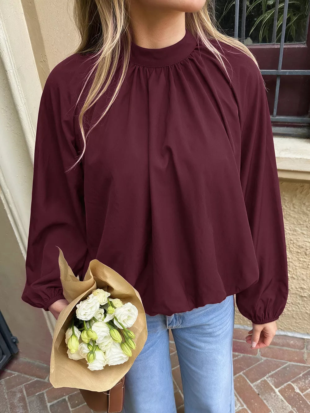 96% polyester, 4% elastane Care instructions: Machine wash cold blouse in burgundy with relaxed silhouette