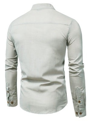 Light grey long sleeve button-up shirt with button cuffs and a textured fabric.