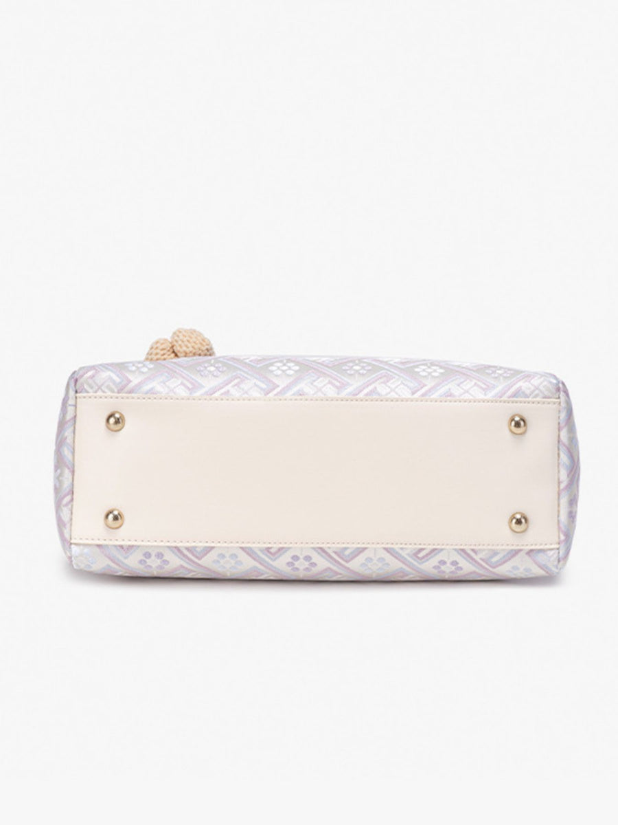 handbag featuring geometric in Pink Purple with Polyester Imported Size &amp texture
