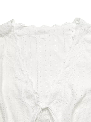 t-shirt featuring eyelet in White with 95% polyester, 5% elastane Care instructions: Machine wash cold texture
