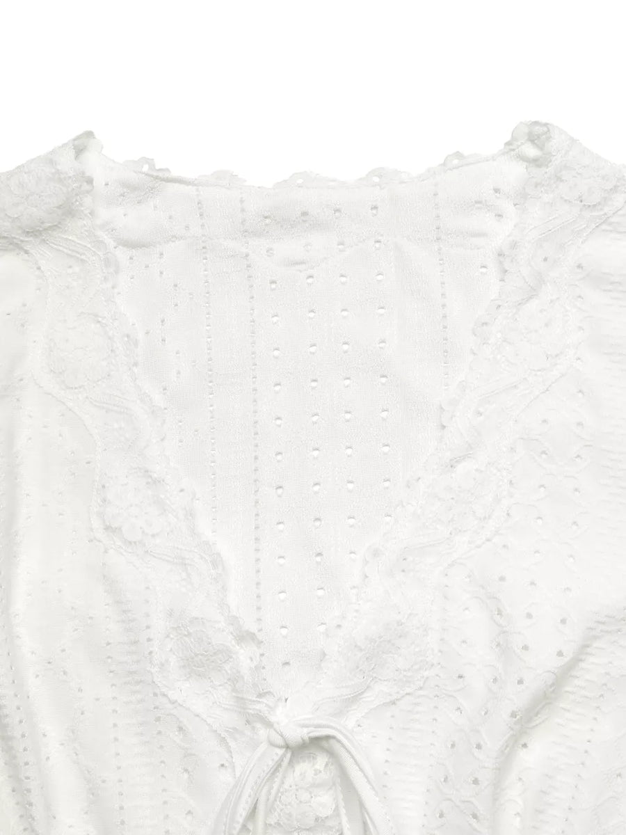 t-shirt featuring eyelet in White with 95% polyester, 5% elastane Care instructions: Machine wash cold texture