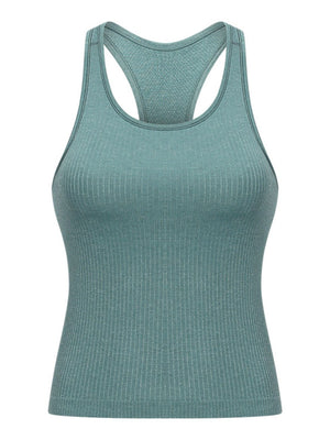 Turquoise ribbed racerback performance tank top with a seamless knit texture.