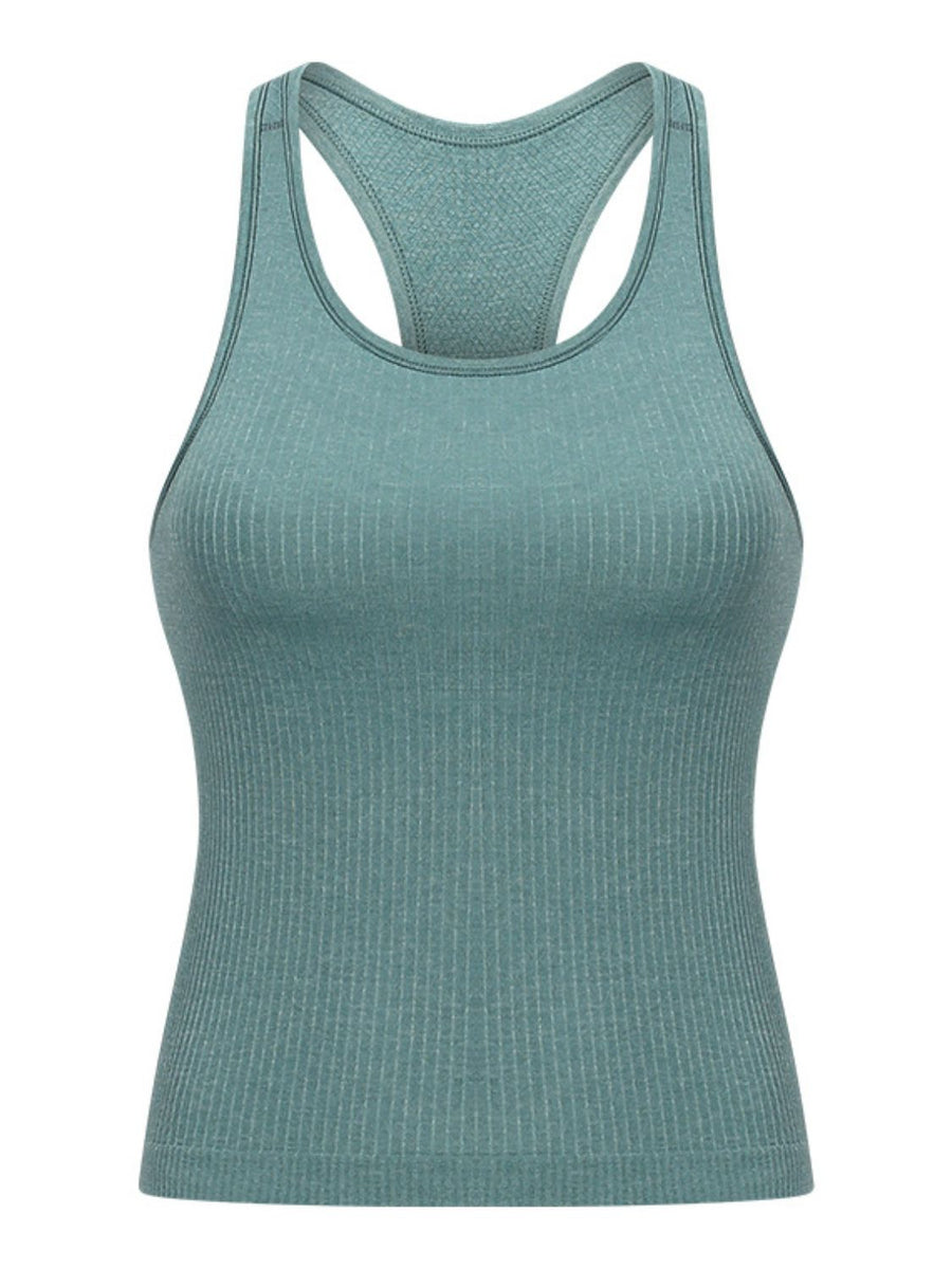Turquoise ribbed racerback performance tank top with a seamless knit texture.