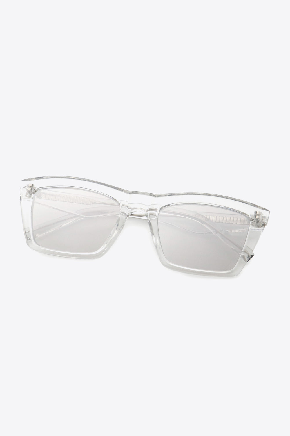 Clear acetate angular sunglasses with light gray lenses and a modern angular design.
