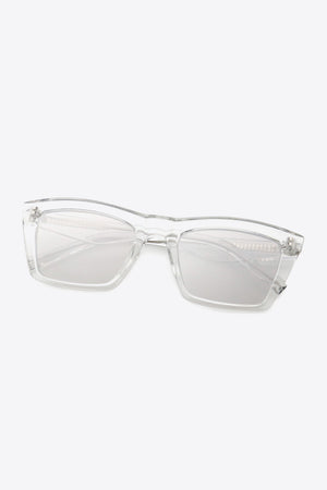 Clear acetate angular sunglasses with light gray lenses and a modern angular design.
