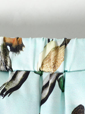 Baby shorts set in turquoise cotton blend with a graphic print and elastic waistband.