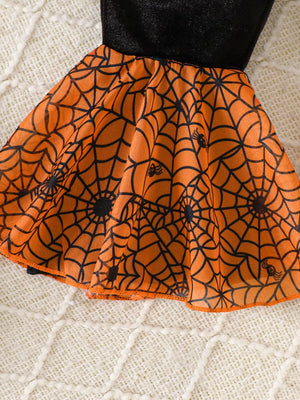 pajama set in black with pumpkin embroidery, spiderweb print and long sleeve