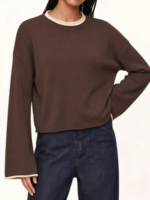 camel crewneck sweater with raw hem and long sleeve