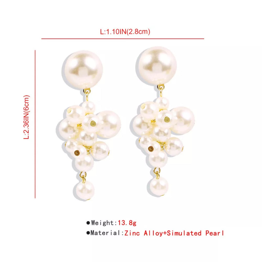 earrings in ivory with cluster design and long