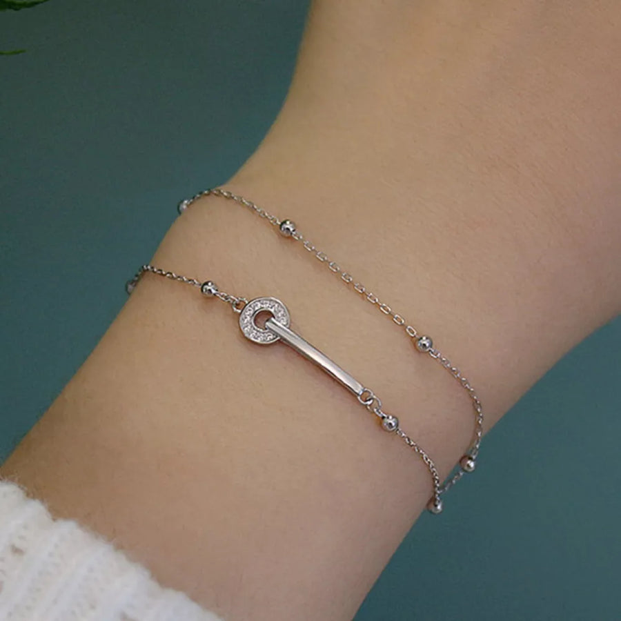 Platinum-Plated,925 sterling silver,Rhinestone Care instructions: Avoid wearing bracelet in clear with layered silhouette
