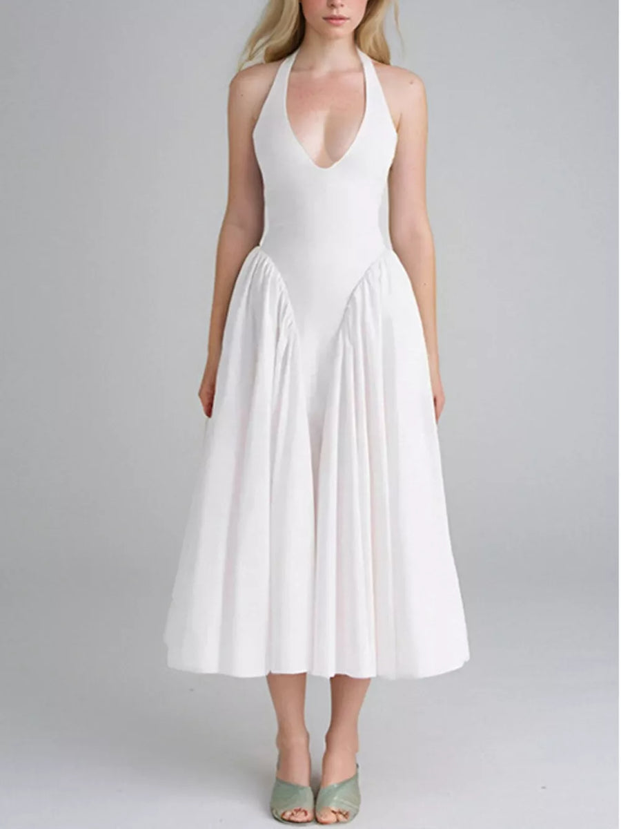 White halter neck midi dress with deep V-neck and full skirt
