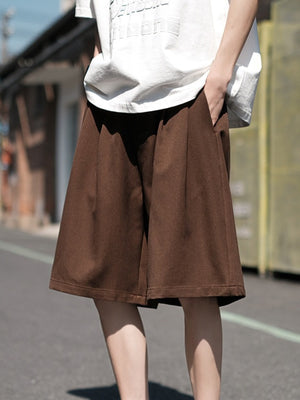 Men's dark brown loose-fit casual shorts with pockets