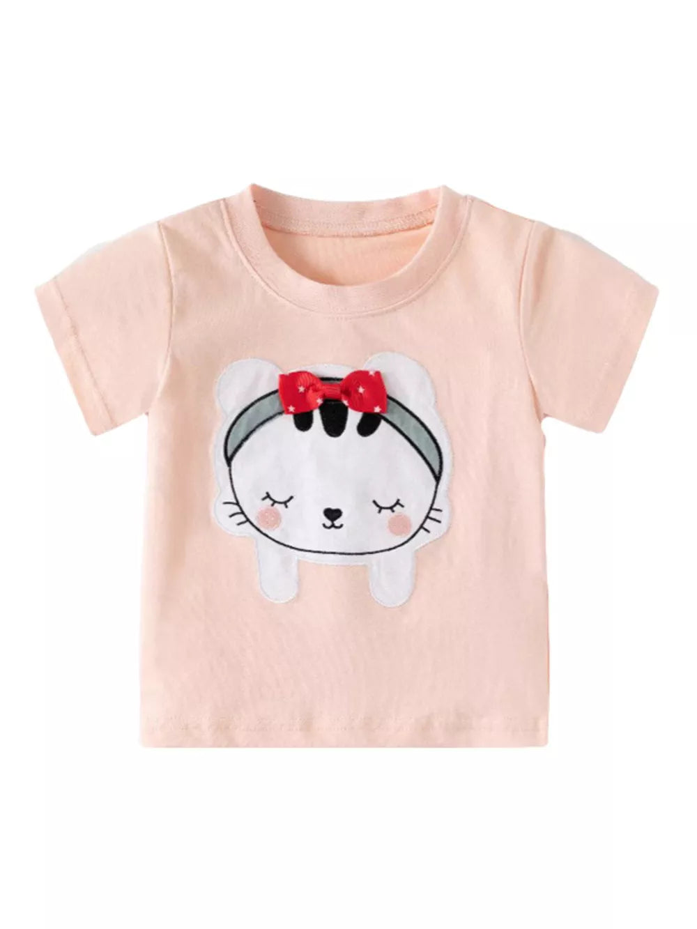 Peach toddler t-shirt with a whimsical cat appliqué featuring a red 3D bow.