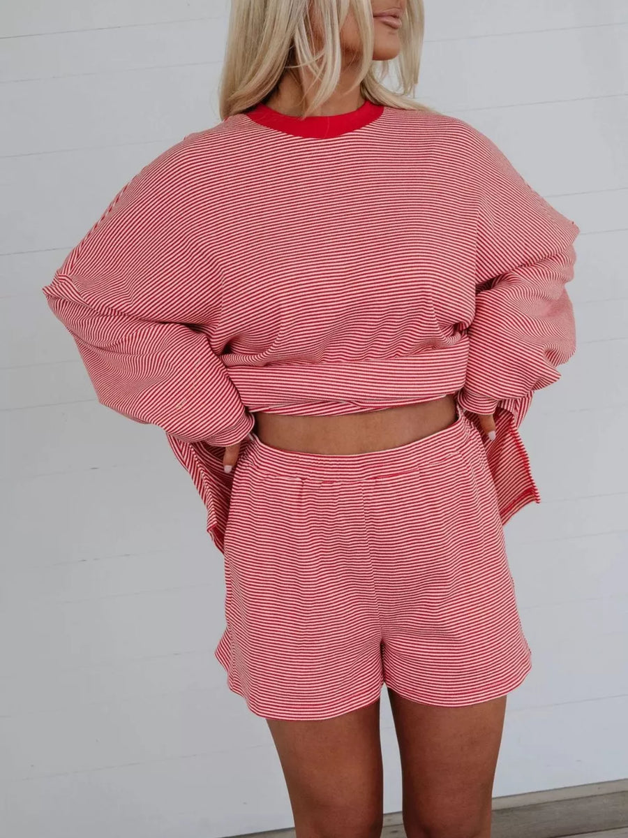 red pajama set with side pockets and long sleeve