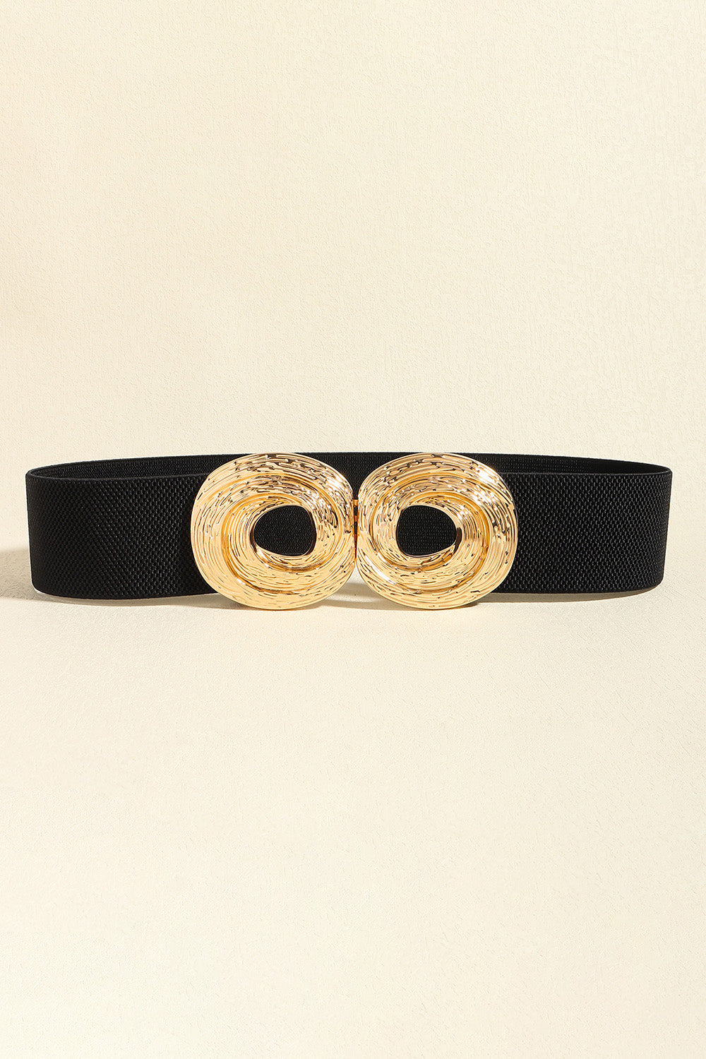 Black elastic belt with a double gold sculptural buckle