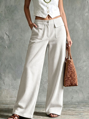 wide-leg pants in ivory featuring pocketed and wide-leg fit