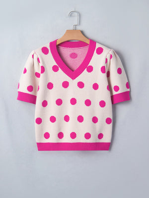 Cream polka dot knit top with hot pink trim and puff sleeves