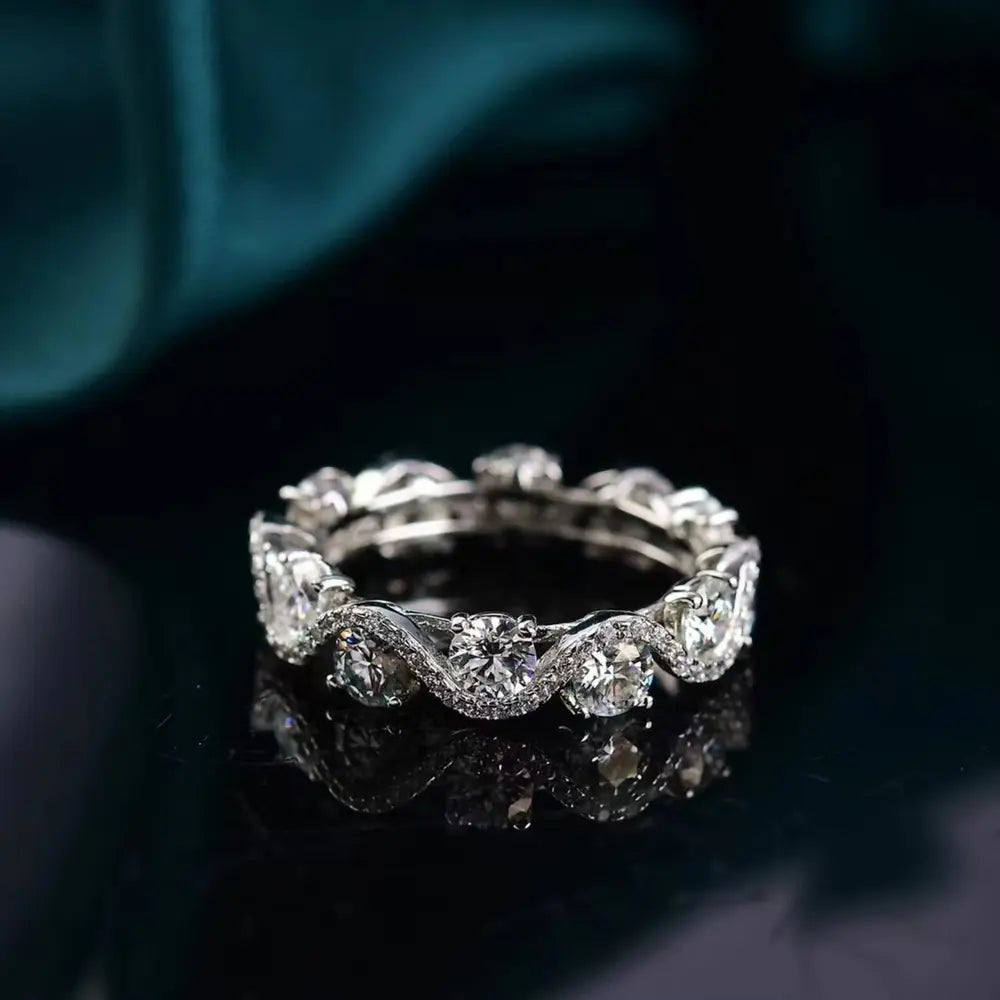 Silver moissanite eternity wave ring with round cut stones