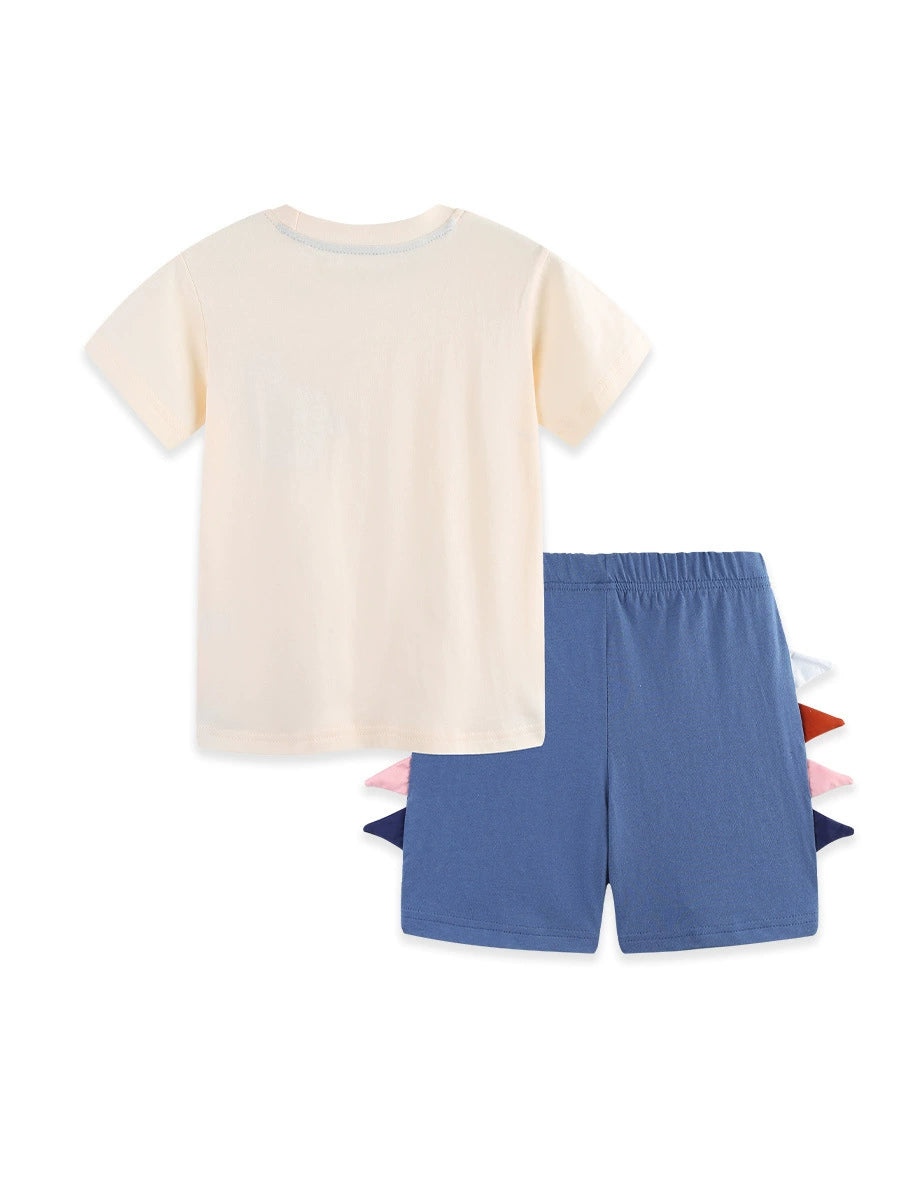 Baby boys' cream graphic tee and blue shorts set with dinosaur spikes.