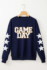 Navy sweatshirt with "GAME DAY" graphic and white stars on sleeves.