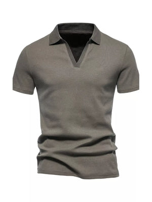 Men's light gray cotton blend polo shirt with notched collar and short sleeves.