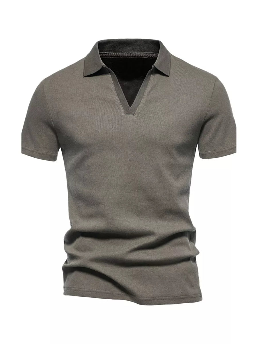 Men's light gray cotton blend polo shirt with notched collar and short sleeves.