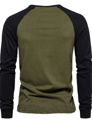 Army green and black colorblock raglan long sleeve t-shirt.