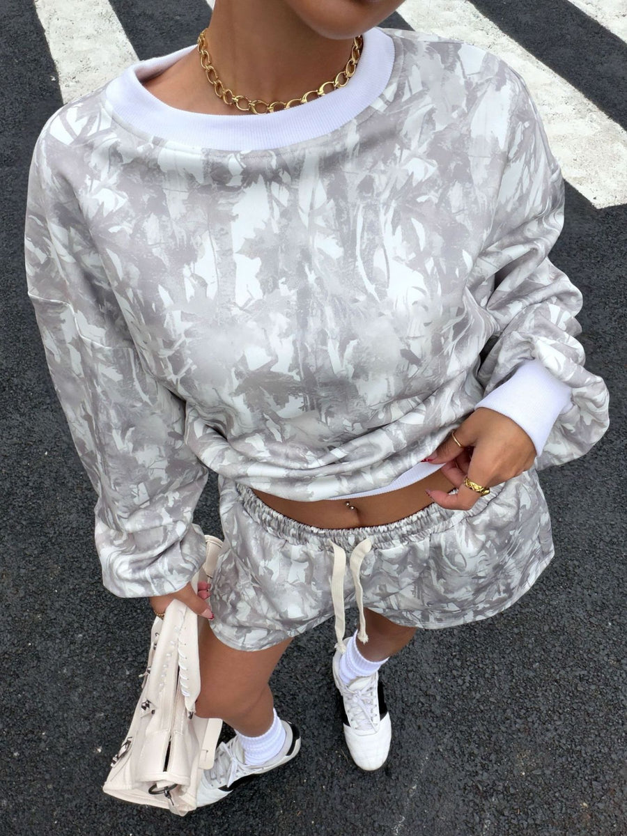 Round neck long sleeve abstract print top and drawstring shorts set with white cuffs and trim