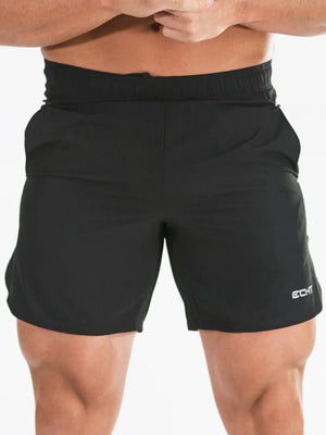 Black athletic shorts with elastic waistband and white logo detail.