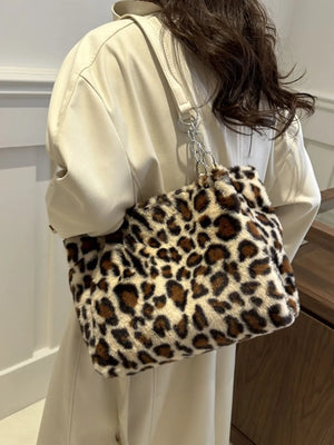 Leopard print faux fur shopper bag with chain handle and beige leatherette straps.