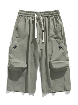 Light gray cargo capris with adjustable drawstring and large side pockets.