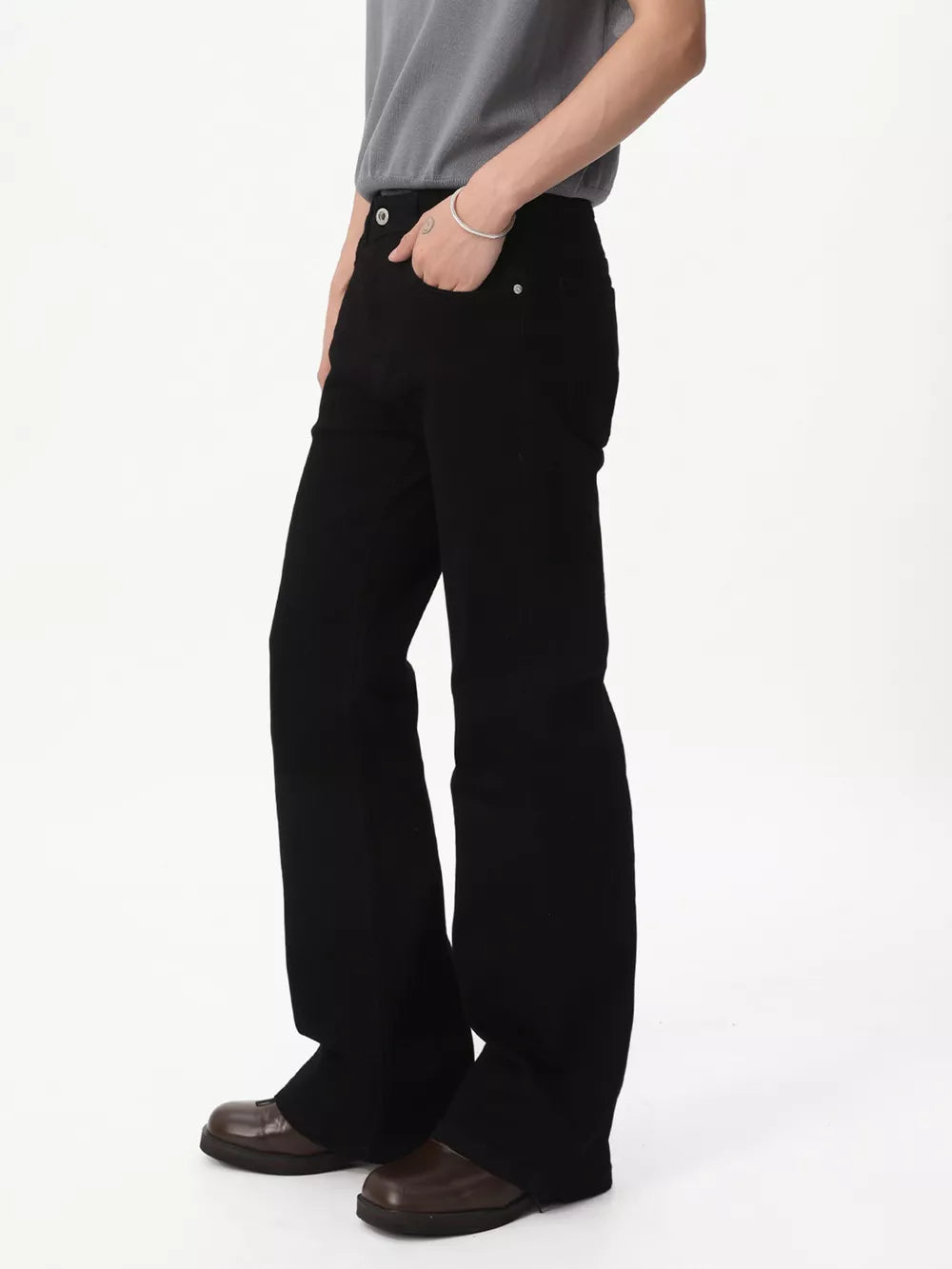 Black relaxed fit bootcut men's jeans with a casual style.