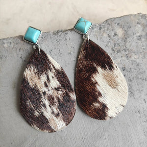 Textured cow print teardrop earrings with turquoise square tops