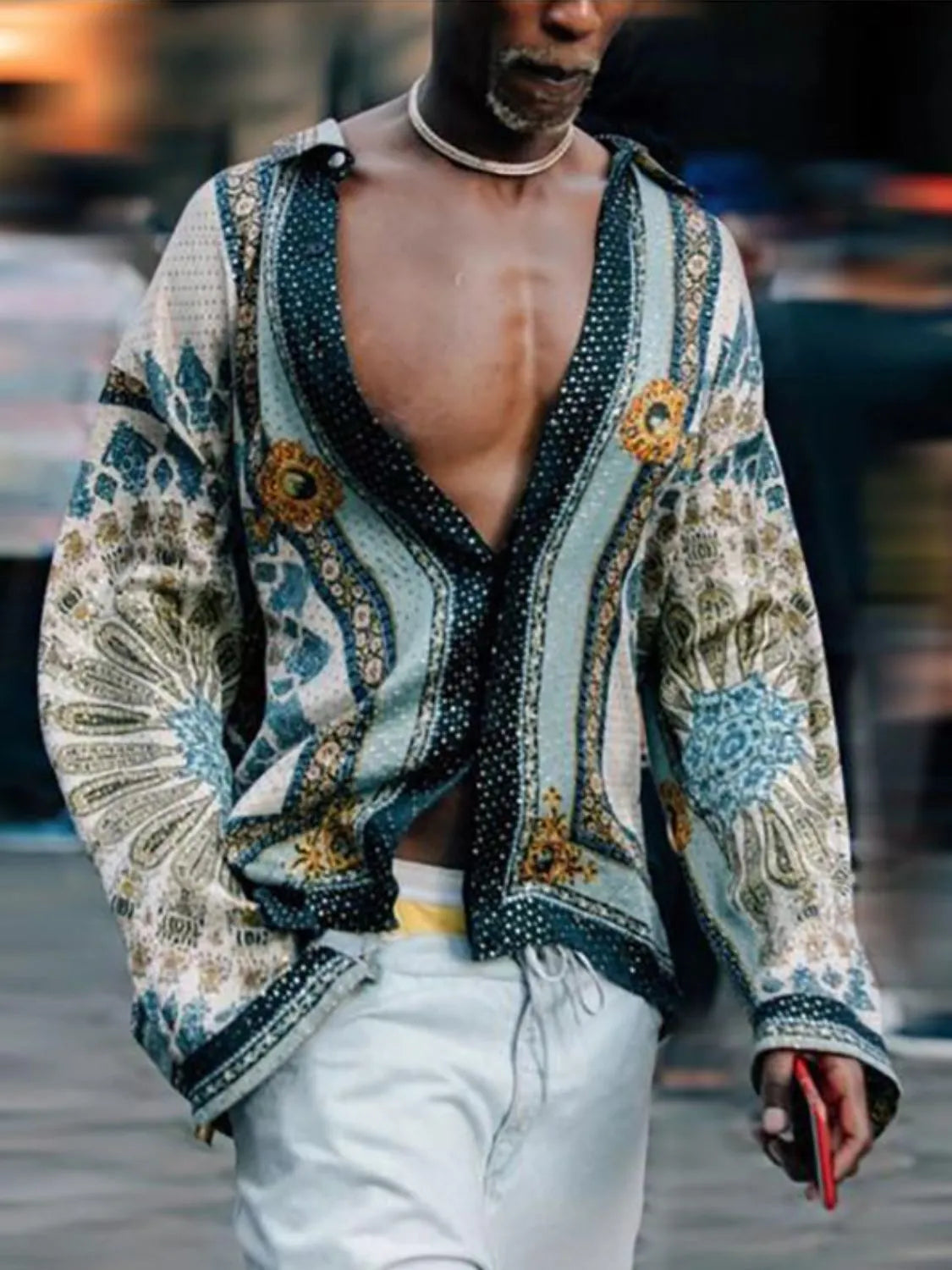 Bohemian print open-front silk shirt with a deep V-neck and long sleeves.