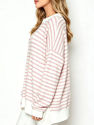 Pink pullover sweater with hip-length and pullover