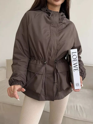 100% polyester Care instructions: Machine wash cold windbreaker in Black with relaxed silhouette