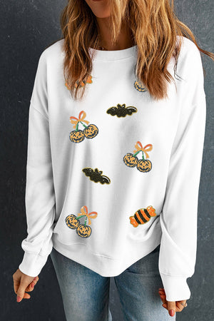 gold pullover sweater with hip-length and pullover