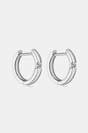Silver pavé point huggie hoop earrings with a single stone detail