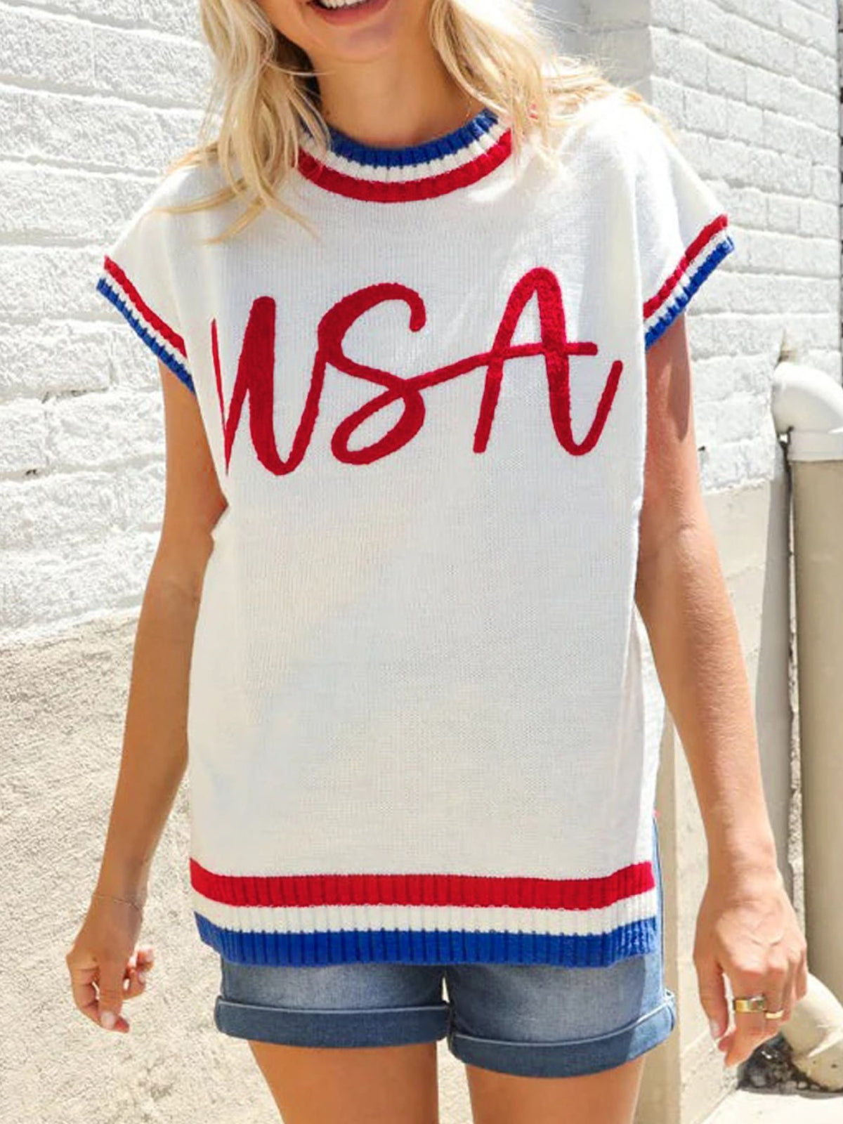 White knit sweater vest with USA embroidery and striped trim