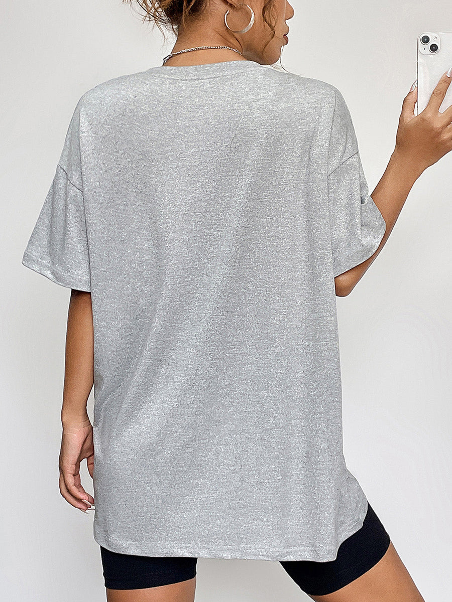 Gray graphic tee with short sleeves and a crew neck, shown from the back.