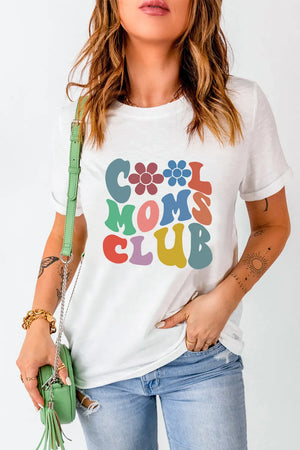 White graphic tee with colorful "Cool Moms Club" text and flower details.