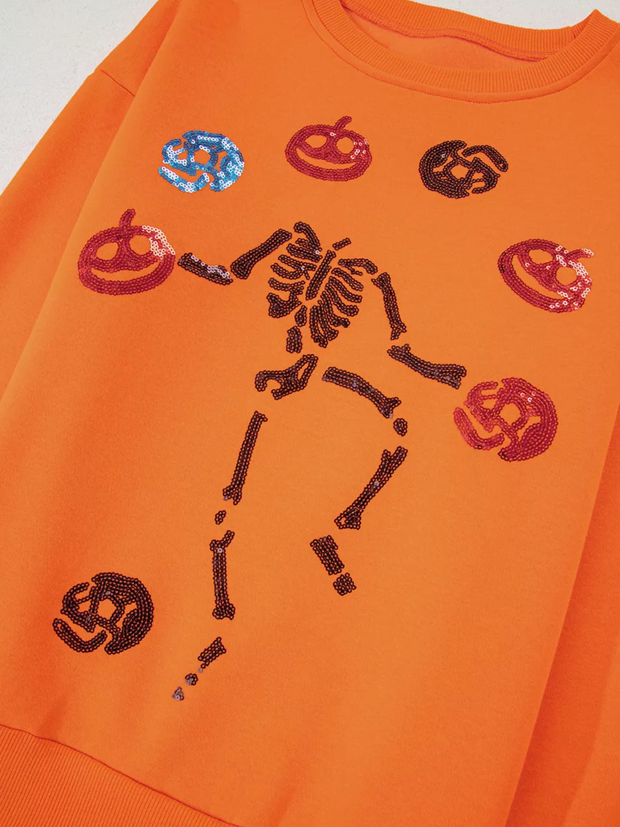 orange crewneck sweater with pullover and graphic