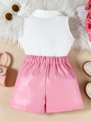 Pink faux leather shorts with elastic waist and white collared sleeveless top.