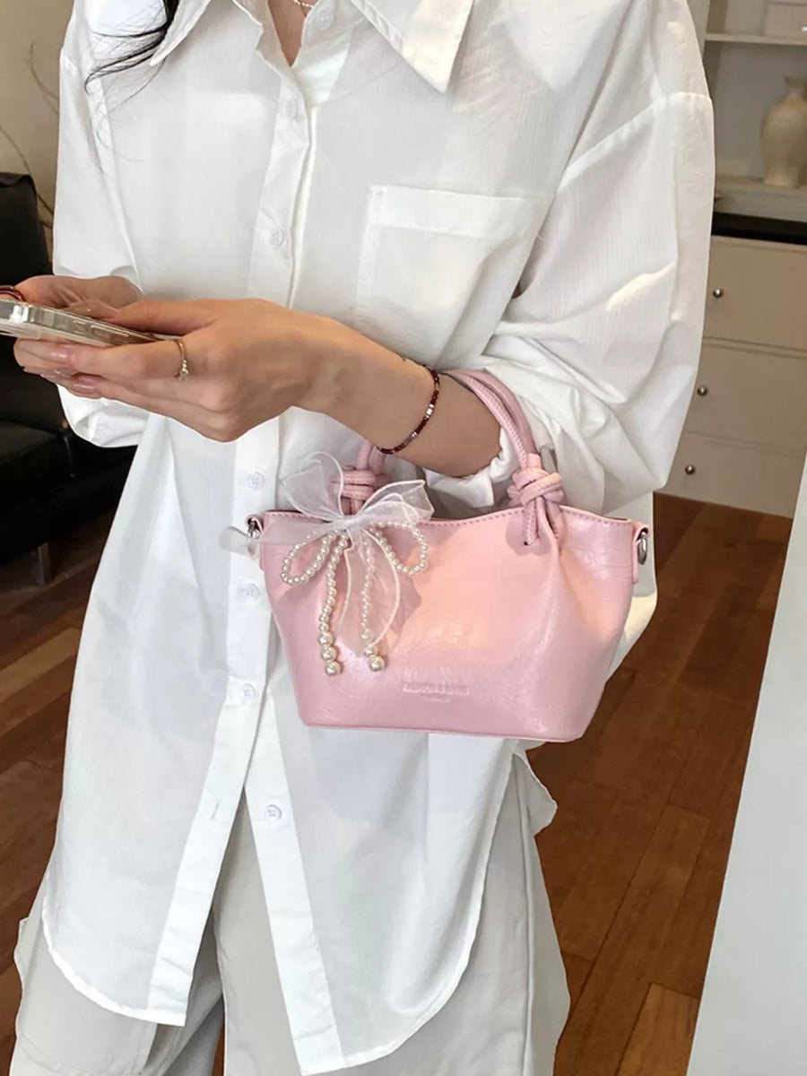 PU Leather Imported Size &amp crossbody bag in Pink with structured silhouette