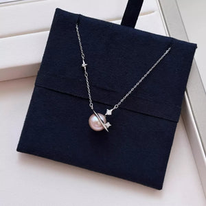 Celestial pearl and silver pendant necklace with star accents
