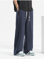 Men's navy blue loose-fit drawstring sweatpants with pockets