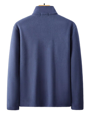Men's blue fleece quarter zip sweatshirt with a mock neck.